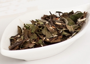 White loose leaf tea with Ginger and a little crushed chilli